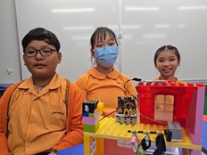 Students presenting their Smart Drying Rack project. 