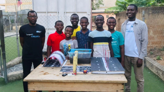 Some of the teachers and students who have benefitted from The MakersPlace's training, with Douglas Ayitey, a micro:bit Champion